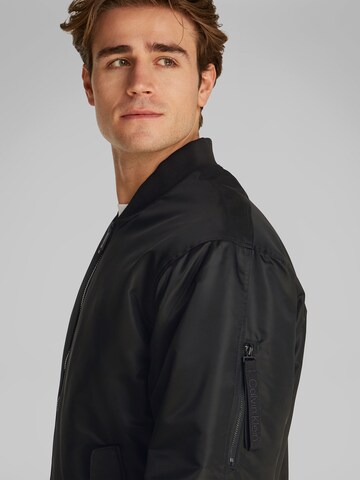 Calvin Klein Jeans Between-season jacket 'HERO' in Black