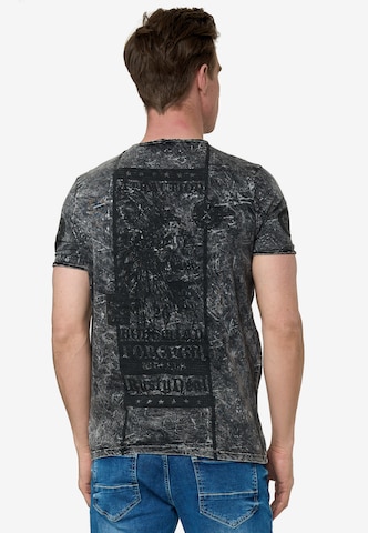 Rusty Neal T-Shirt mit Oil Washed Skull All Over Front Print in Grau