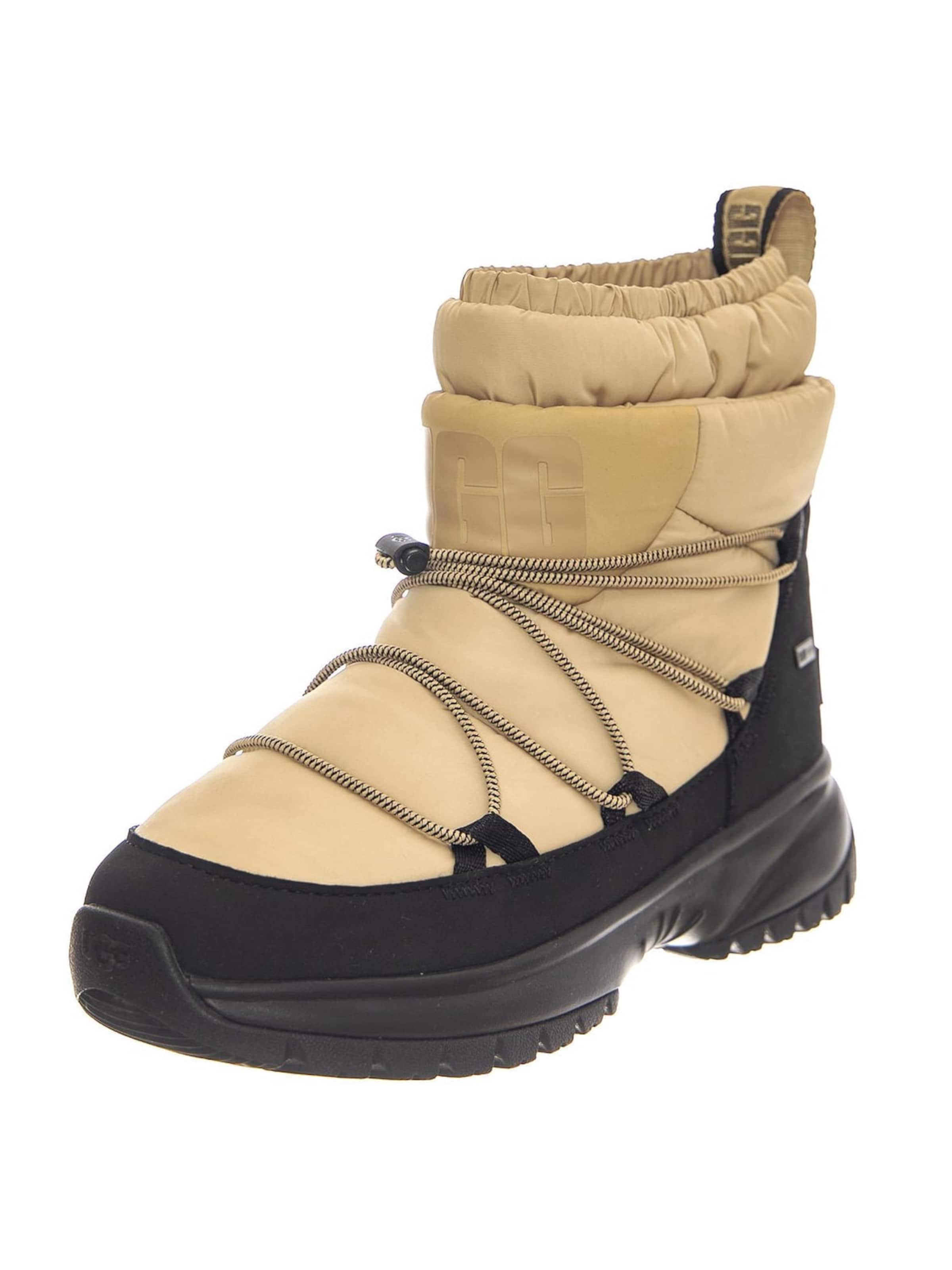Bottes 'W Yose Puffer Mid Sand' UGG en beige : devant