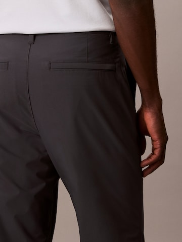 Calvin KleinSlimfit Hlače - plava boja