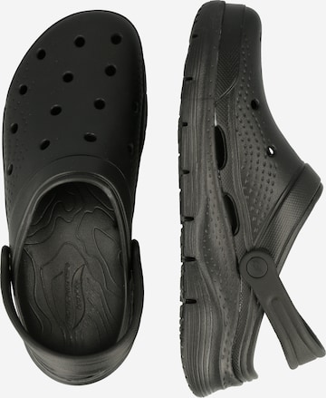 SKECHERS Puukengät & Crocs-jalkineet värissä musta