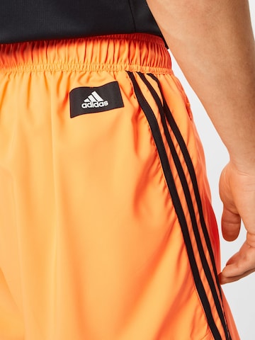 ADIDAS PERFORMANCE Широка кройка Спортен панталон в оранжево