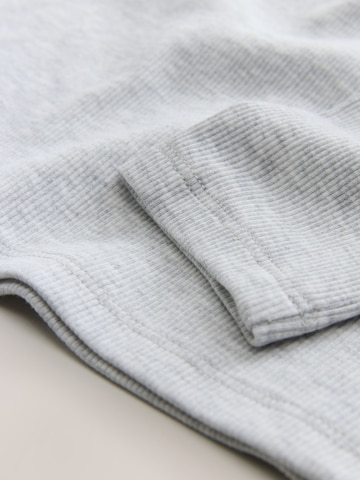 T-Shirt Next en gris