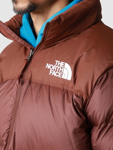 THE NORTH FACE Regularny krój Kurtka zimowa 'M 1996 Retro Nuptse' w kolorze brązowy