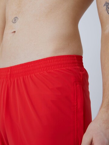 SPORTKIND Regular Sportbroek in Rood
