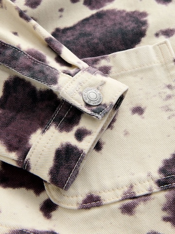 Next Přechodná bunda – bílá