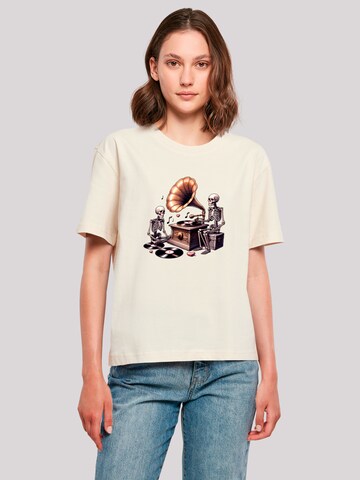 T-shirt 'Gothic Skeleton Vintage Vinyl Plattenspieler' F4NT4STIC en beige : devant