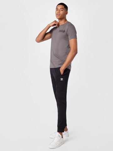 Effilé Pantalon 'Adicolor Essentials Trefoil' ADIDAS ORIGINALS en noir