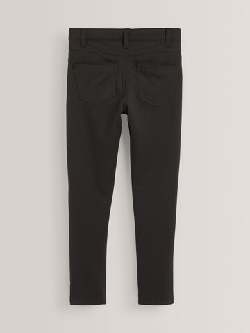 Slimfit Pantaloni di Next in nero