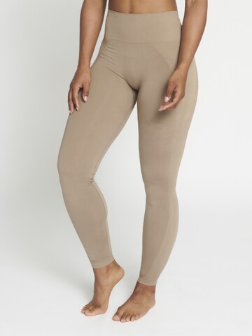 rethinkit studios Skinny Leggings 'Hella' in Brown: front