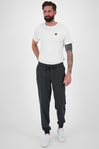 Tapered Pantaloni 'MoeAK' di Alife and Kickin in nero