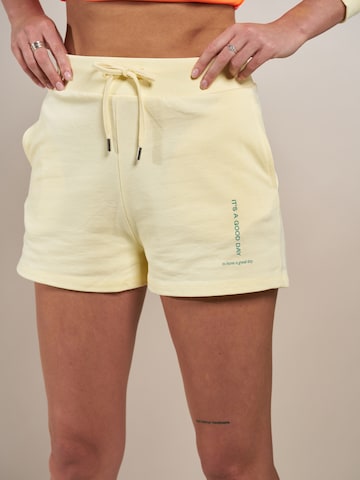 ABOUT YOU x Laura Giurcanu Regular Pants 'Luna' in Yellow