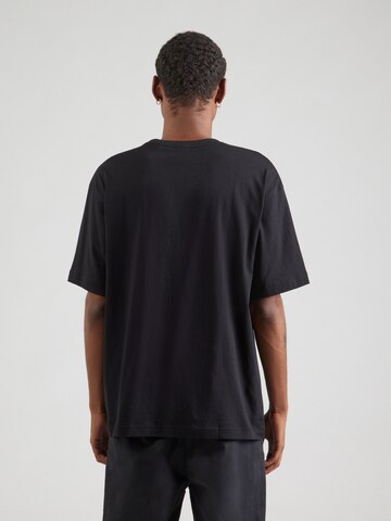 BOSS - Camiseta 'Voyage' en negro