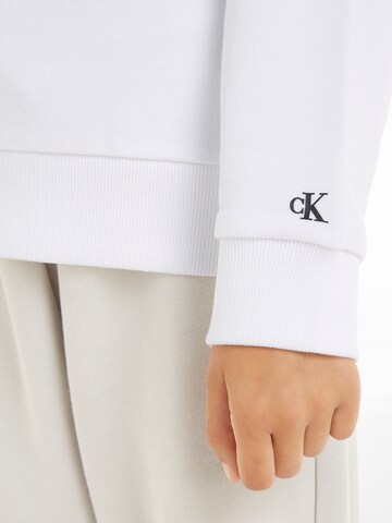 Calvin Klein JeansSweater majica - bijela boja