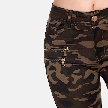 Skinny Jeans di Elara in verde