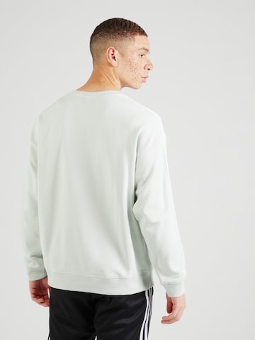 ADIDAS SPORTSWEAR Sportsweatshirt 'Essentials' in Grün