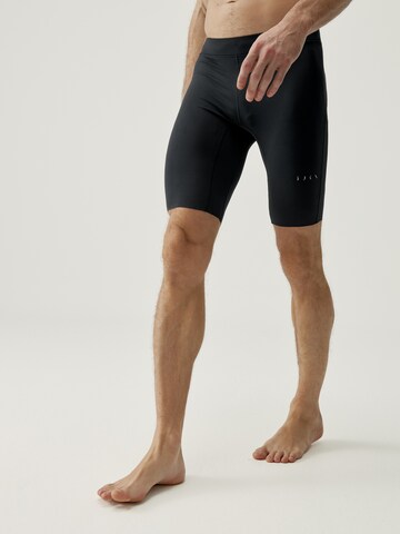 Born Living Yoga Skinny Weatherproof pants 'Bay' in Black