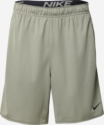 Pantaloni sport 'Totality' de la NIKE pe verde: față