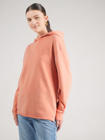 Superdry Sweatshirt 'Studios' in Oranje: voorkant