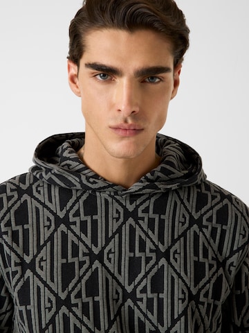 GUESS Sweatshirt i svart