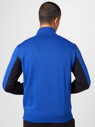 Champion Authentic Athletic Apparel Trainingspak in Blauw