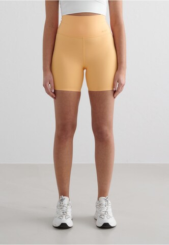Aim'n Skinny Sportbroek 'Sense' in Oranje: voorkant