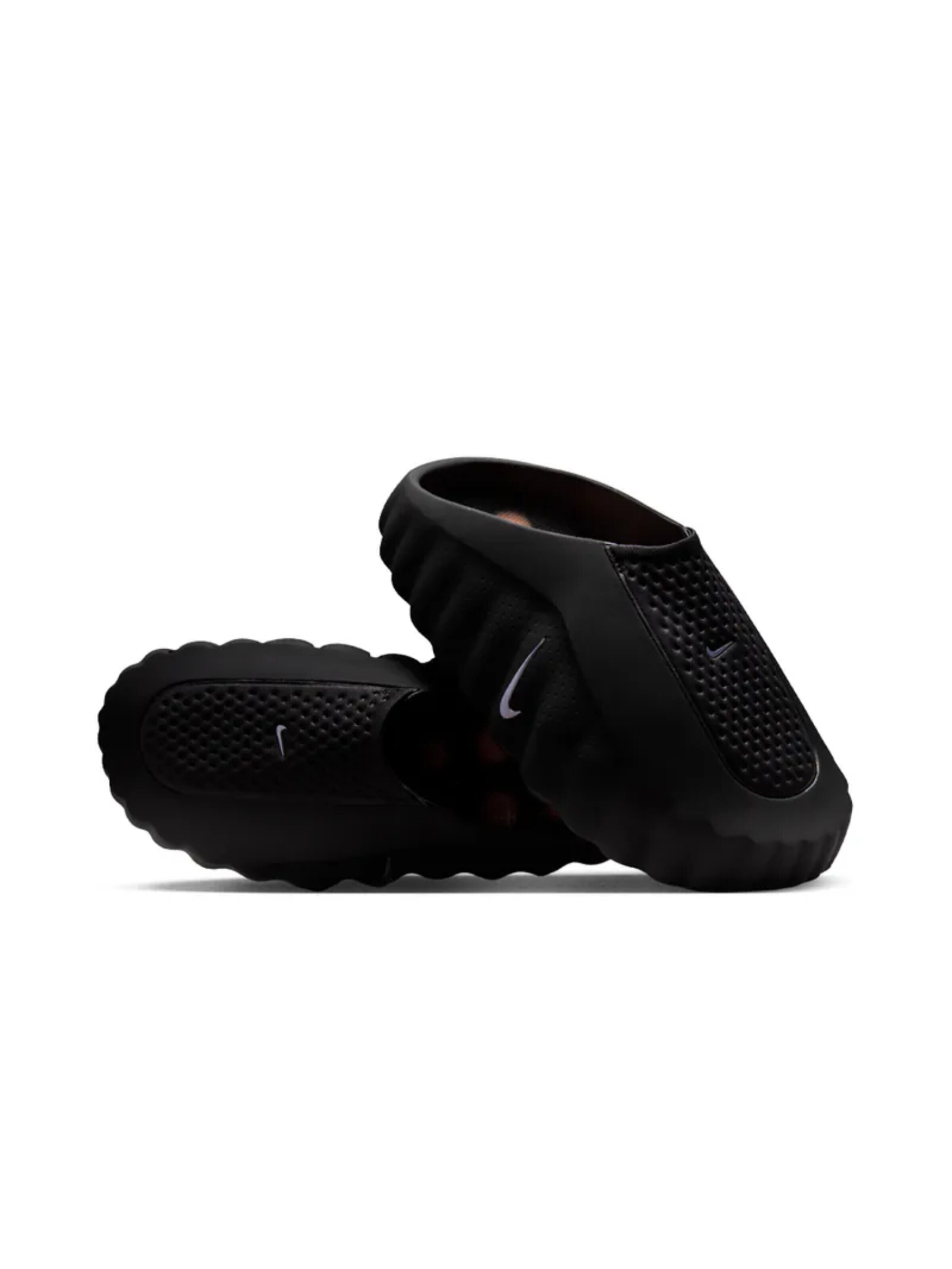 NIKE Slip-Ons in Black: front