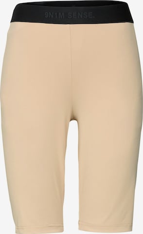 9N1M SENSE Skinny Leggings in Brown: front
