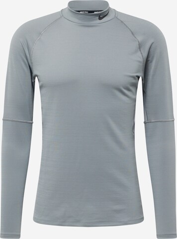 Maglia funzionale di NIKE in grigio: frontale