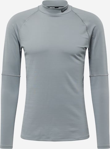 NIKE - Camisa funcionais em cinzento: frente