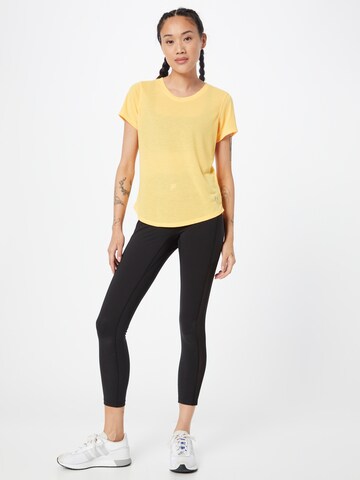 UNDER ARMOUR Funkcionalna majica 'Streaker' | oranžna barva