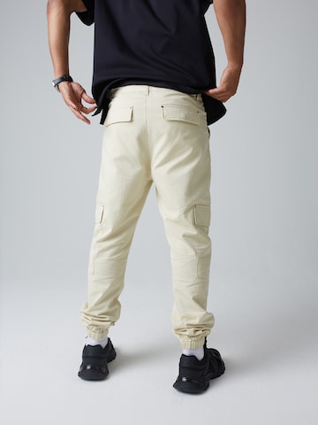 ABOUT YOU x Benny Cristo Regular Cargo trousers 'Noah' in Beige