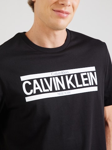 Calvin Klein Bluser & t-shirts i sort