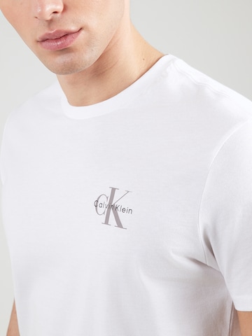 Calvin Klein Jeans Tričko – bílá