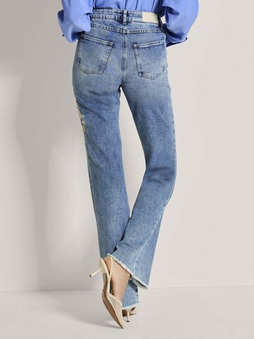 évasé Jean MADELEINE en bleu