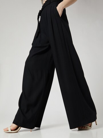 Guido Maria Kretschmer Women Voľný strih Plisované nohavice 'Fee' - Čierna