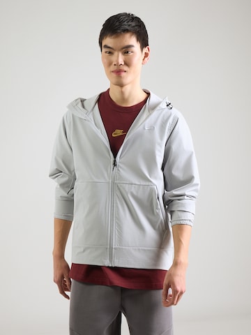 Veste de sport 'Repel Unlimited' NIKE en gris : devant