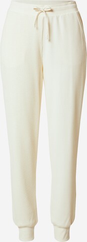 NIKE Tapered Sports trousers in White: front