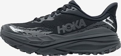 Bėgimo batai 'STINSON 7' iš HOKA, spalva – pilka / juoda, Prekių apžvalga
