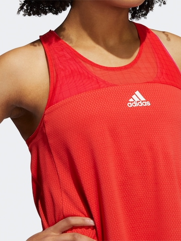 Top sportivo di ADIDAS SPORTSWEAR in rosso