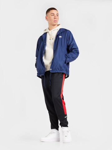 Veste mi-saison 'Club Coaches' Nike Sportswear en bleu