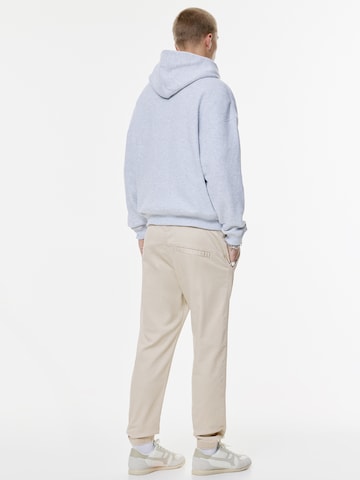 Tapered Pantaloni di Pull&Bear in grigio