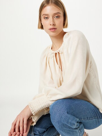 River Island - Blusa en beige