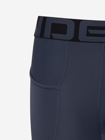 UNDER ARMOUR Skinny Športne hlače 'Novelty' | siva barva