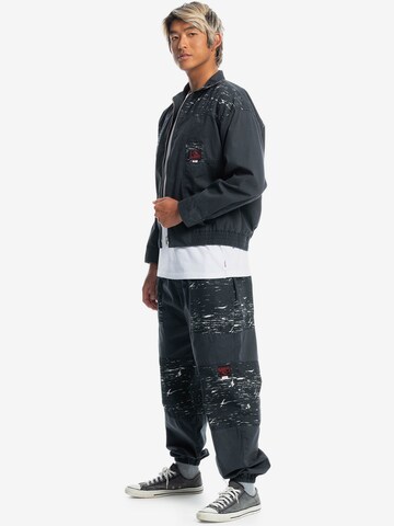 QUIKSILVER Tapered Urheiluhousut värissä musta