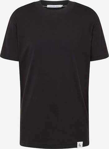 T-Shirt Calvin Klein Jeans en noir : devant