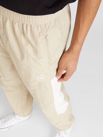 CONVERSE - Tapered Pantalón 'STARSPRINTER' en beige