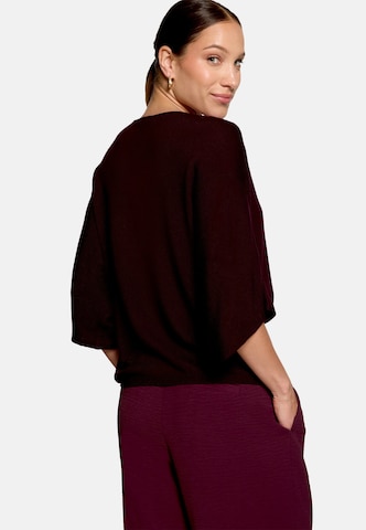 Pullover di zero in rosso