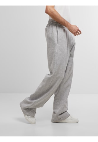 Wide leg Pantaloni di Karl Kani in grigio