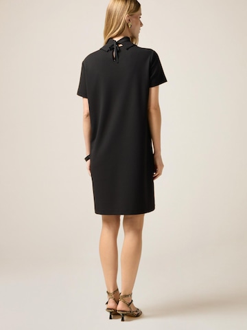 Abito di oltre in nero